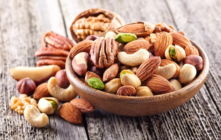 خواص شگفت‌انگیز آجیل برای سلامت قلب، مغز و کنترل دیابت (1404)